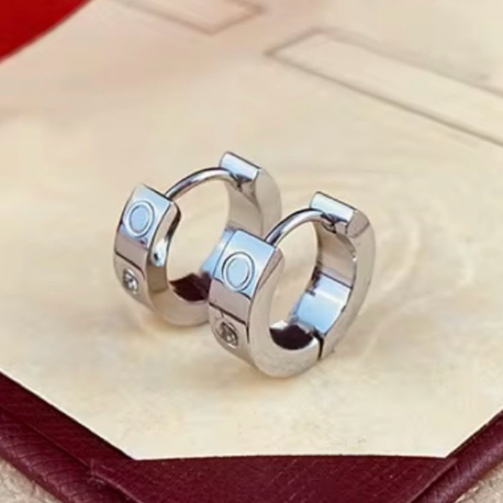 Silver Designer-Inspired Love earrings. 18kt gold plated stainless steel hoops